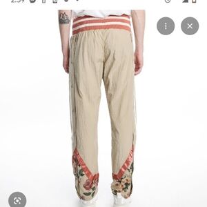 Adidas Beige Joggers with White Stripes